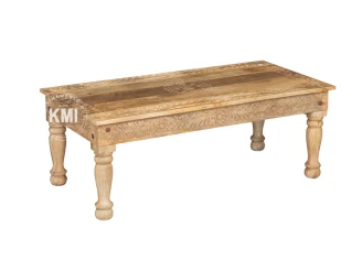 Drewniany stolik ręcznie rzeźbiony w kwiatowe wzory. Meble indyjskie z motywem orientalnym do salonu.